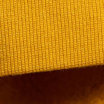 close-up of the cuff on a hoodie to show that it's a ribbed and elasticated hem