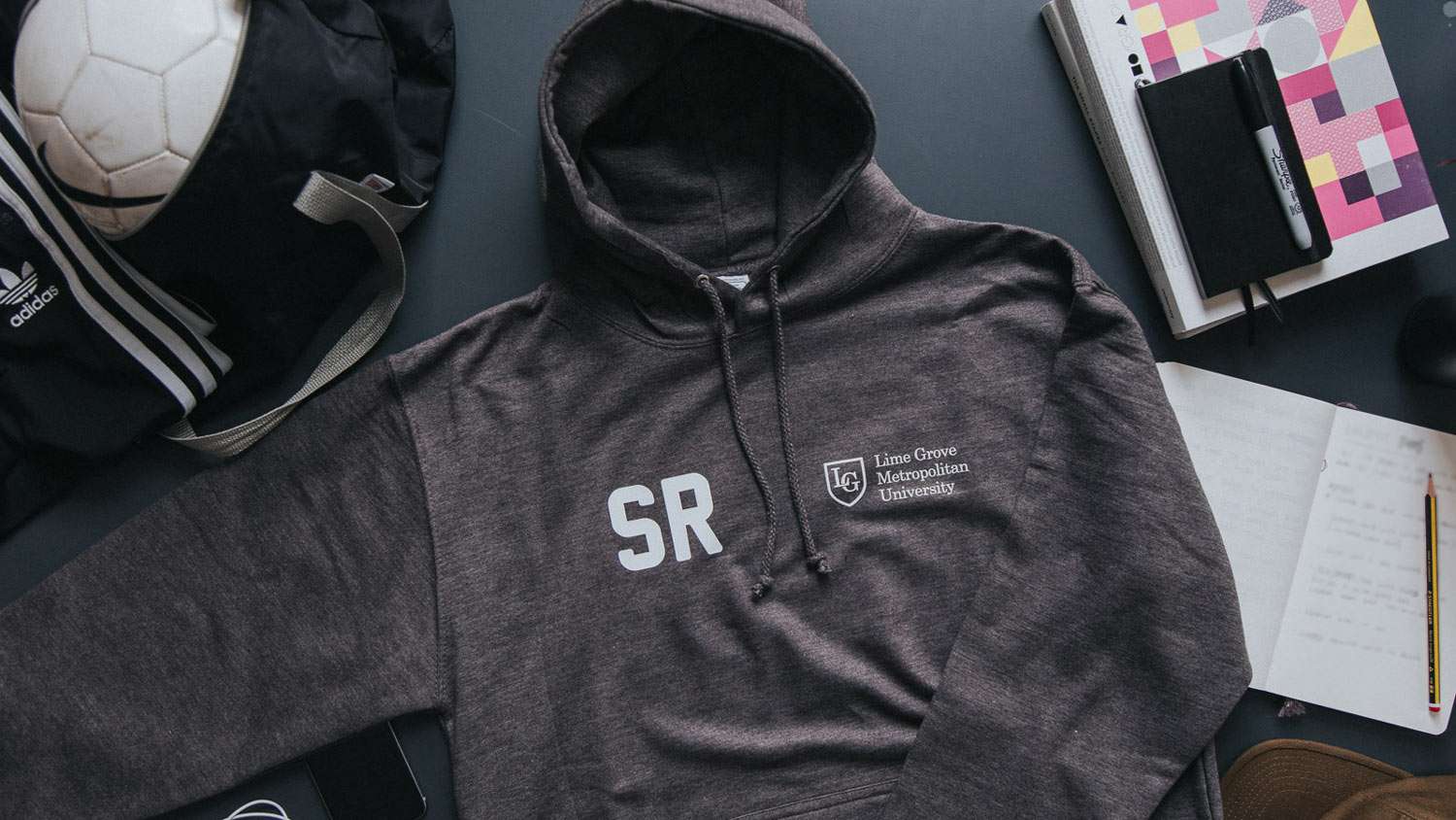 A charcoal grey leavers hoodie with the school logo and individual intials printed on the front