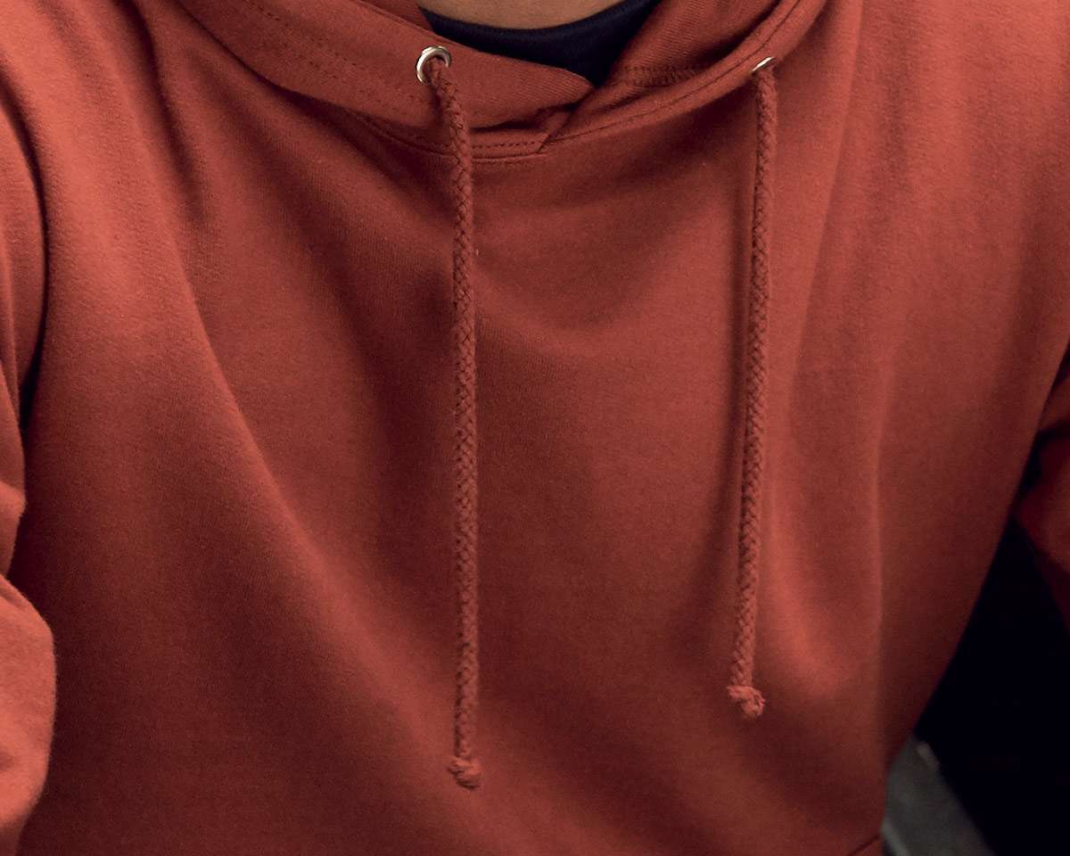 close-up of brick hoodie in a red rust colour