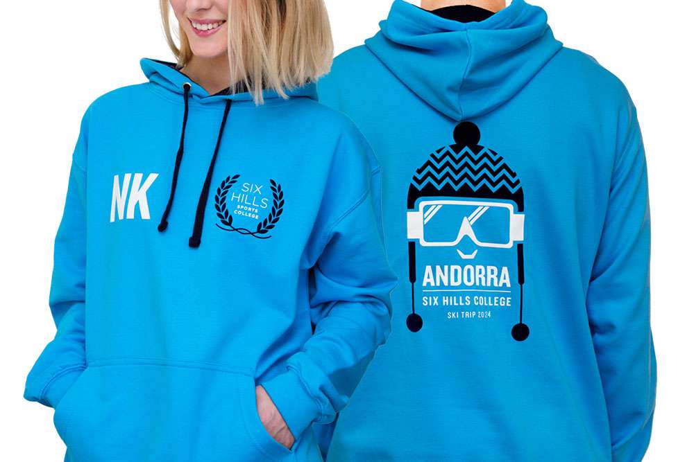 ski hoodies with a school logo and ski trip design printed on the back